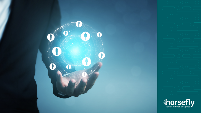 Image shows hand holding orb representing talent intelligence platforms - for the blog - The Role of a Talent Intelligence Platform in Strategic Workforce Planning